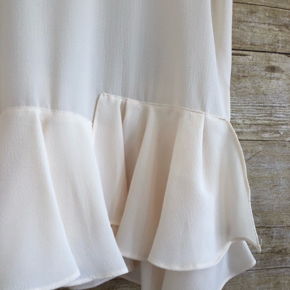 1. State Cream Peplum Tank - Picture 7 of 8